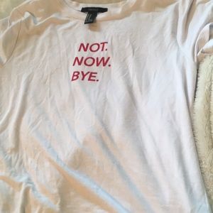 White tee shirt with red lettering